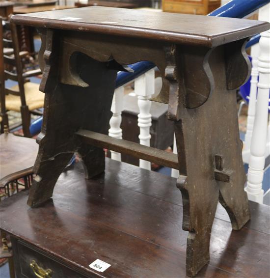 A Tudor style boarded oak stool, H.54cm